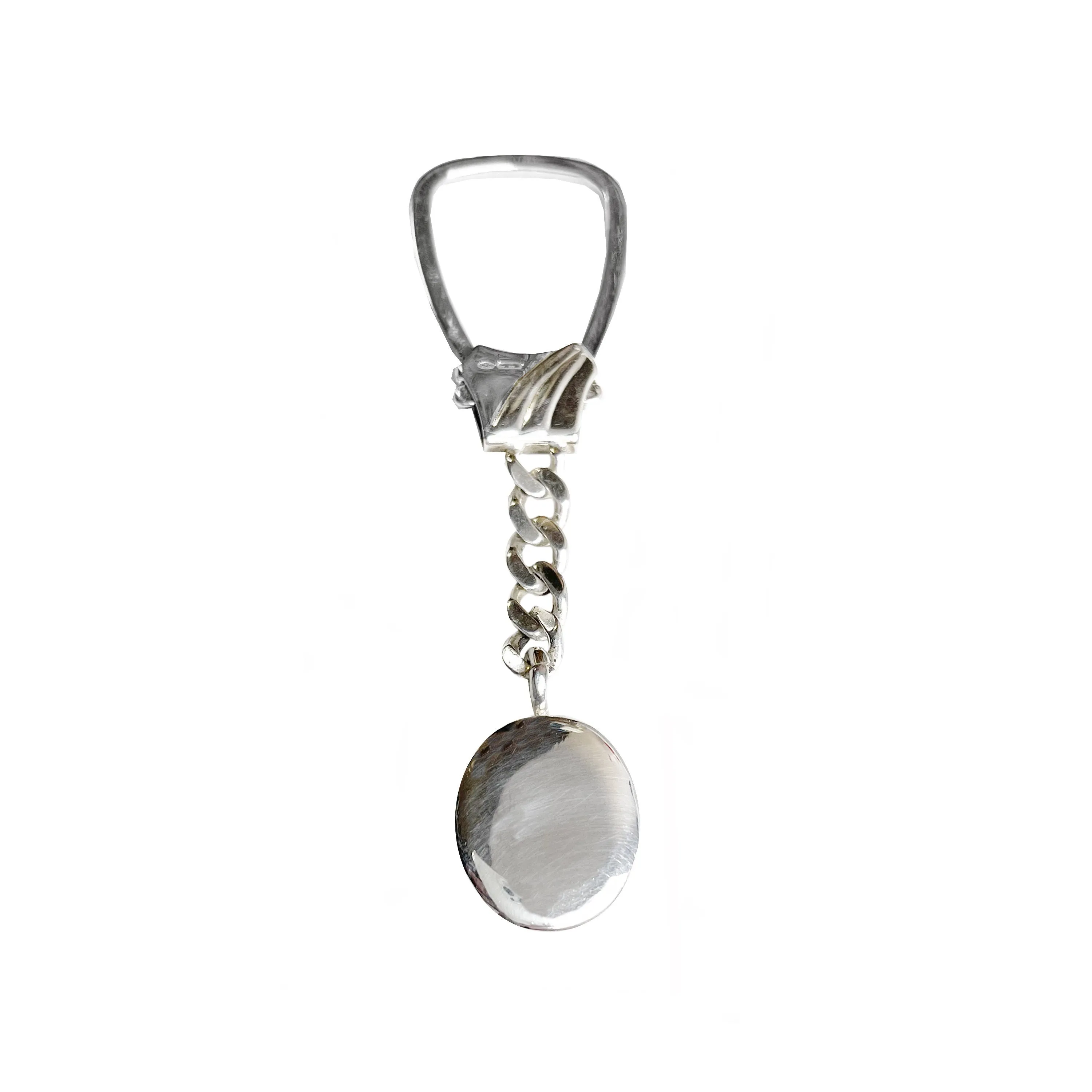 Erotic scene key chain that comes from the cast of an ancient Roman intaglio (1st century AD)